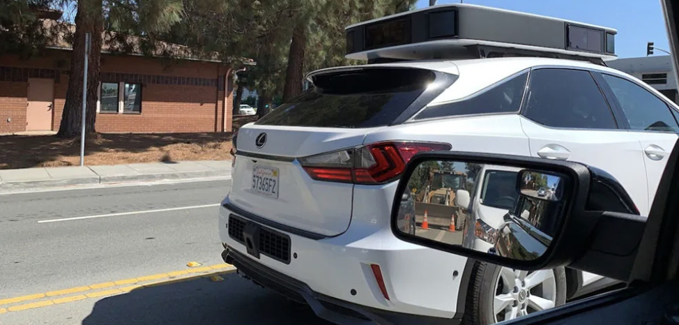 apple car driverless race